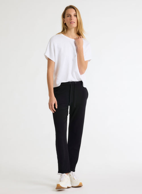 Black Daphne cuffed hem pants in Viscose / Elastane - MAJESTIC FILATURES
